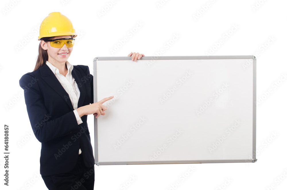 Young builder woman with blank board isolated on white Young builder woman with blank board isolated on white