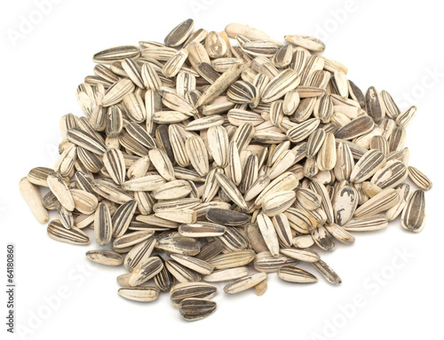 Fotografie Sunflower seeds isolated on white background