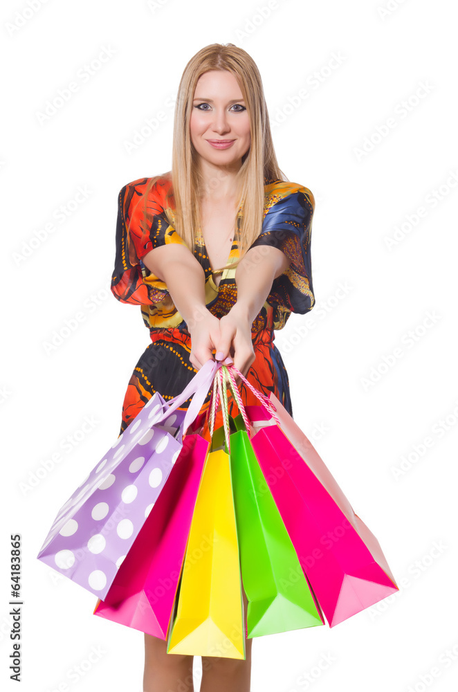 Young woman after shopping isolated on the white Young woman after shopping isolated on the white