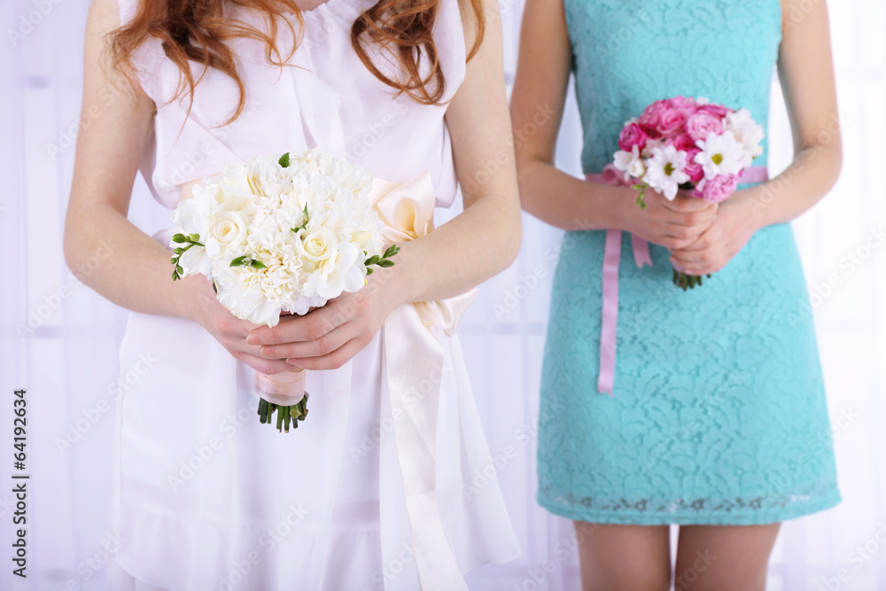 Woman hands holding beautiful wedding bouquet