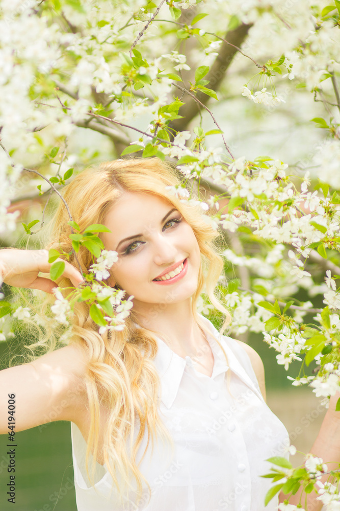 Fototapeta premium Spring portrait of a beautiful young blonde