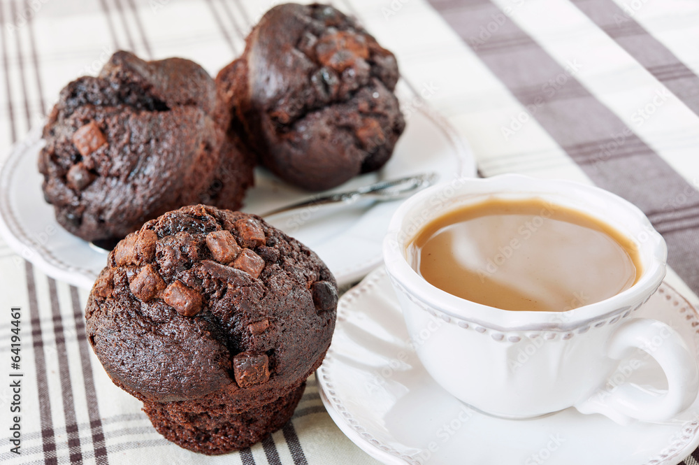Homemade chocolate muffins/buns with cup of coffee. Still life Homemade chocolate muffins/buns with cup of coffee. Still life