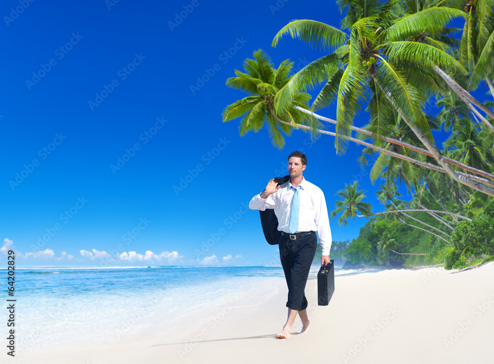 Businessman Walking Along the Tropical Beach Businessman Walking Along the Tropical Beach