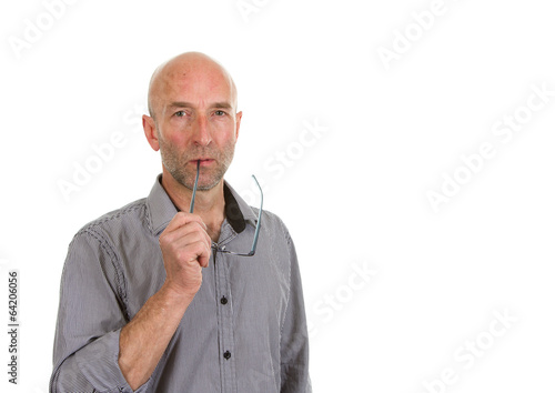 Konstfotografi Man stood thinking with spectacles on a white background