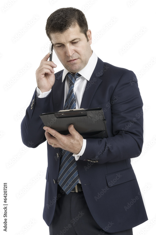 man with a clipboard talking on the phone man with a clipboard talking on the phone
