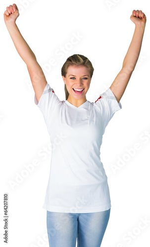 Pretty football fan in white cheering