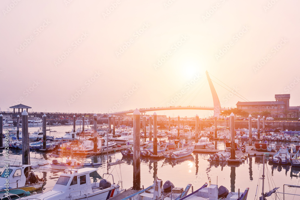 harbor with yachts at sunset