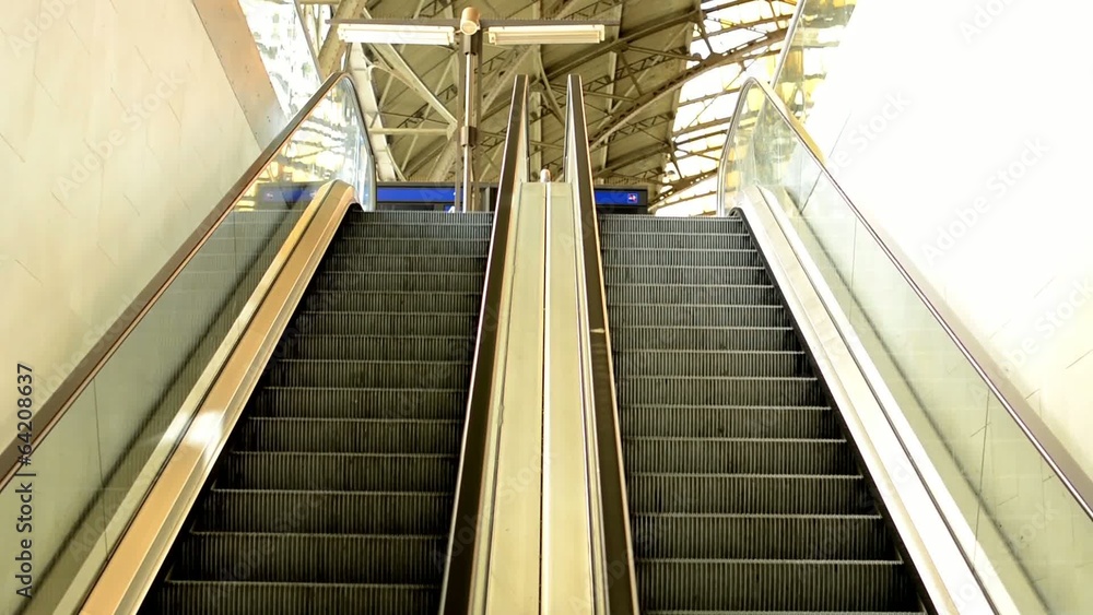 escalators in the train station escalators in the train station