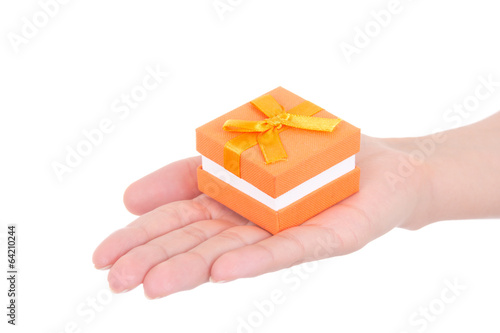 small gift box in woman hand isolated on white background