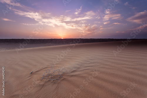 Sonnenuntergang über dem Wüstencamp im Oman