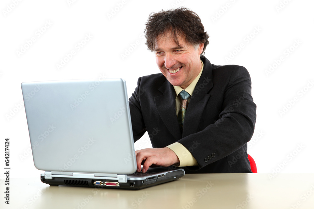 Business man sitting in front of his computer and working Business man sitting in front of his computer and working