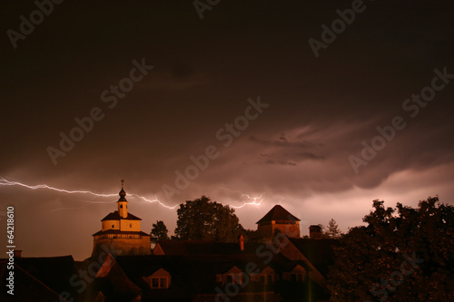 Lightning in a storm in old medival city (Kamnik, Slovenia)