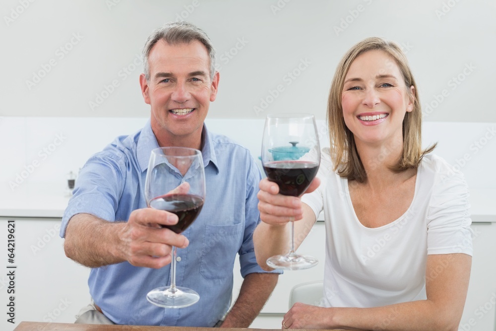 Portrait of a couple holding wine glasses Portrait of a couple holding wine glasses