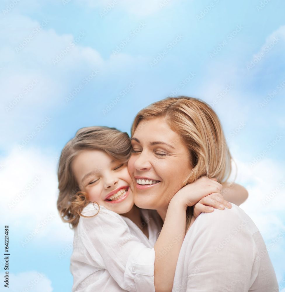 happy mother and daughter hugging