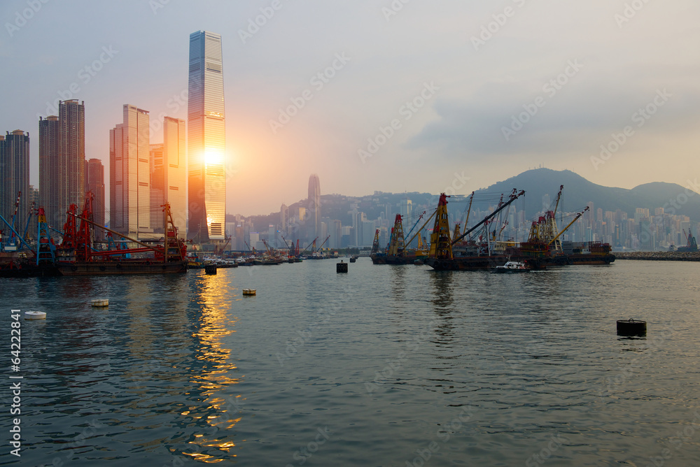 Naklejka premium skyscrapers in Hong Kong at sunset