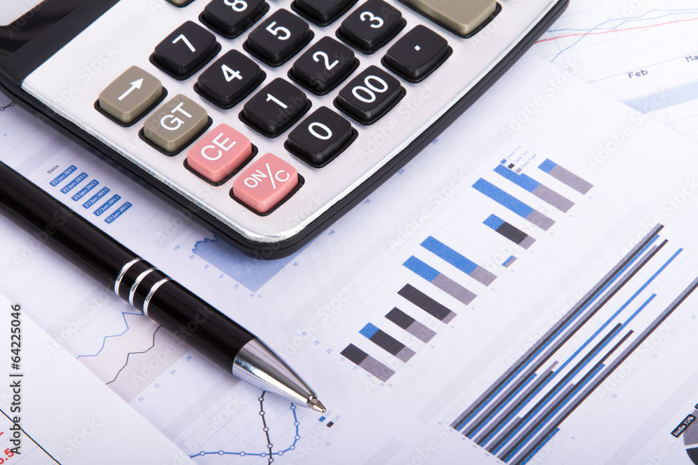 Financial Charts and Graphs on Business Table Financial Charts and Graphs on Business Table