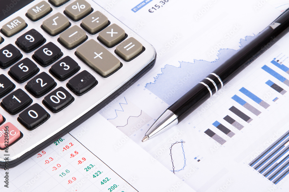 Financial Charts and Graphs on Business Table Financial Charts and Graphs on Business Table