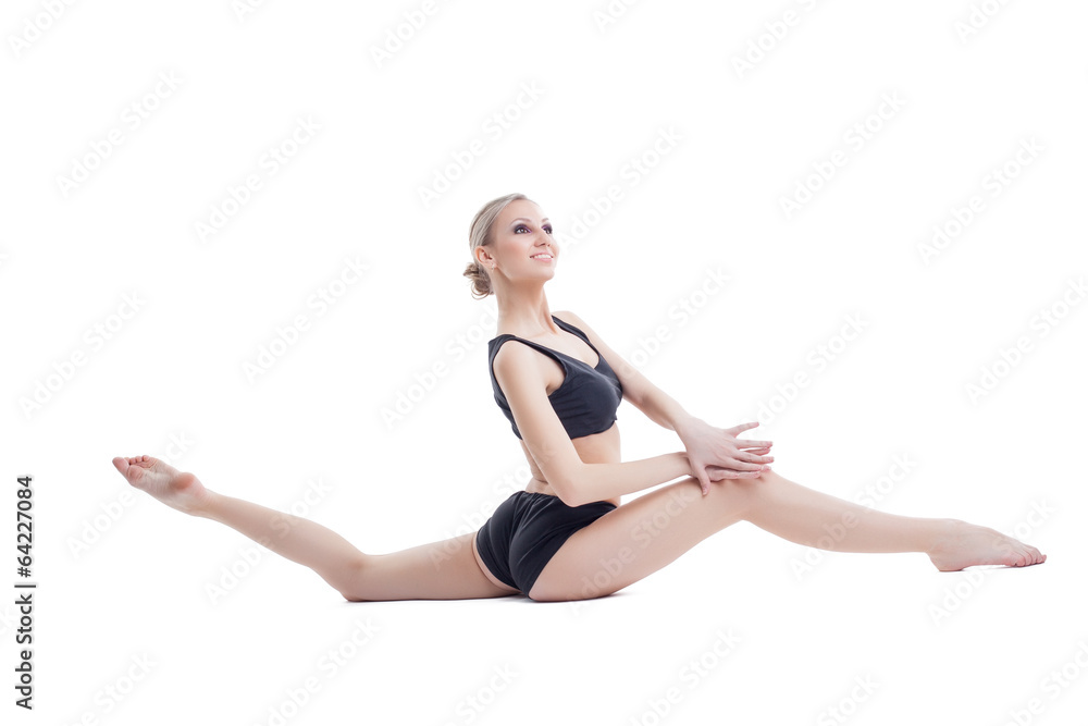 Happy athletic girl doing stretching exercises Happy athletic girl doing stretching exercises