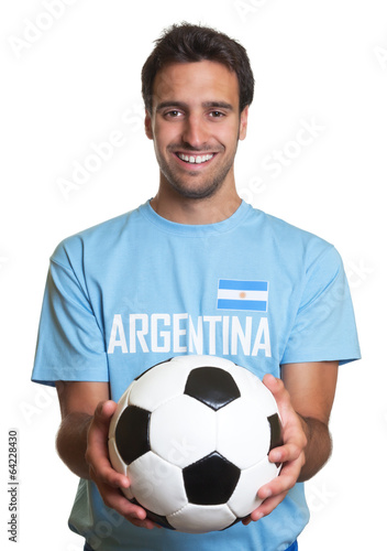 Laughing argentinian man with football