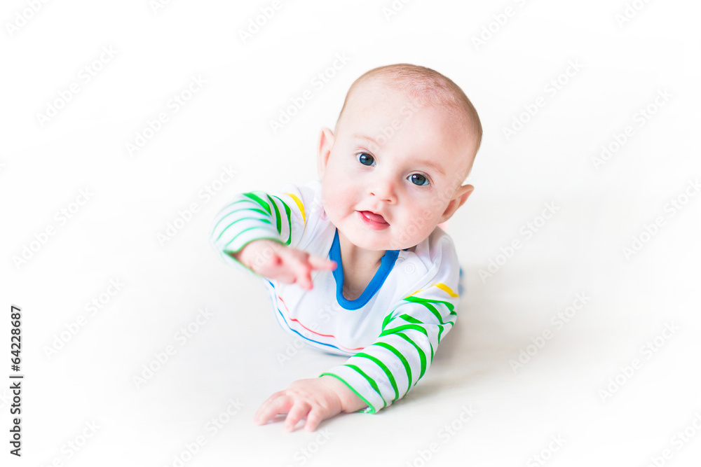 Portrait of happy laughing funny baby boy during tummy time Portrait of happy laughing funny baby boy during tummy time