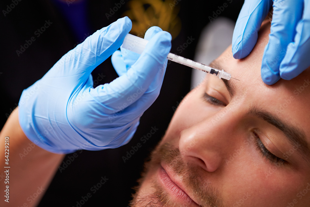 Man Having Cosmetic Injection Treatment at Beauty Clinic - obrazy, fototapety, plakaty 