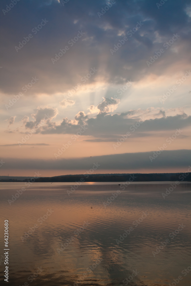 Beautiful sunrise reflected in lake