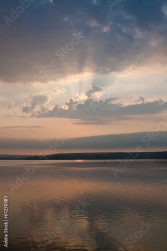 Beautiful sunrise reflected in lake © tsepova
