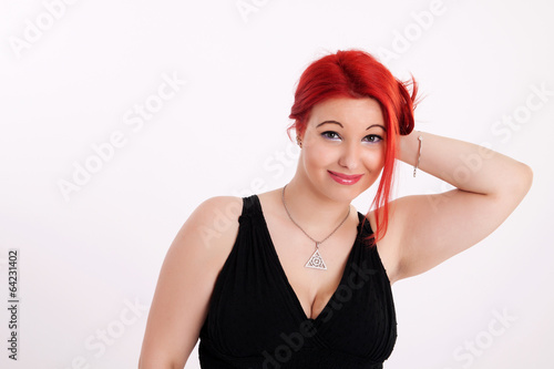 Young plump red-haired woman