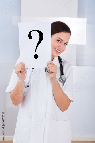 Wallpaper Mural Doctor Holding Question Mark Sign In Hospital Torontodigital.ca