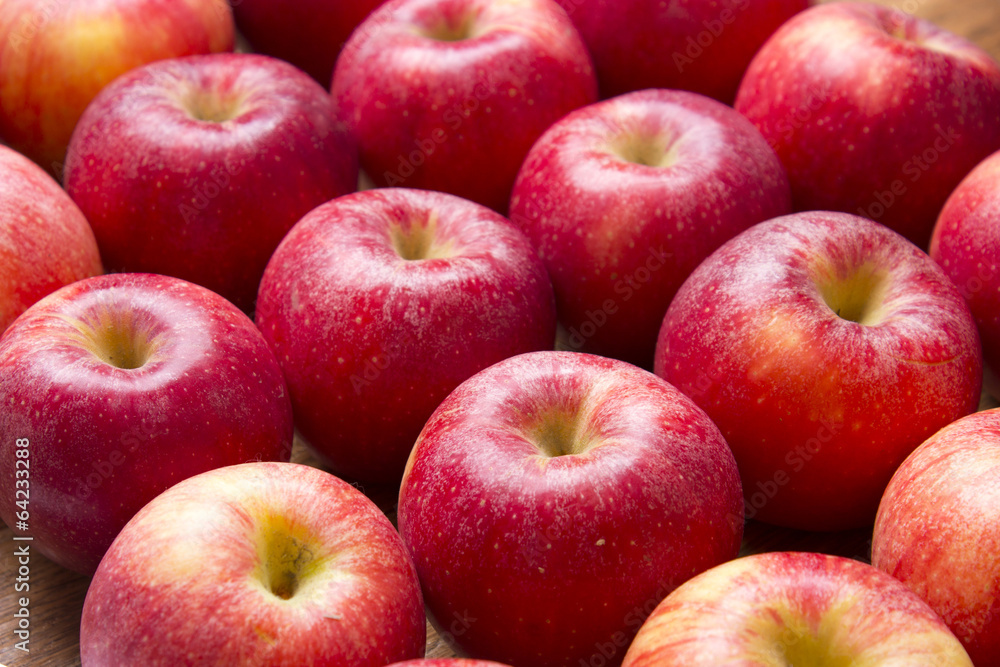 Many red apples on a wooden background. Nature fruit concep Many red apples on a wooden background. Nature fruit concep