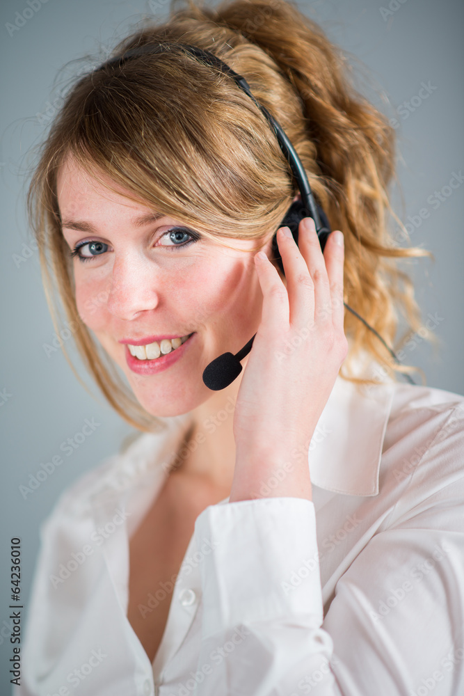 isolated portrait of cheerful blonde telephone operator isolated portrait of cheerful blonde telephone operator