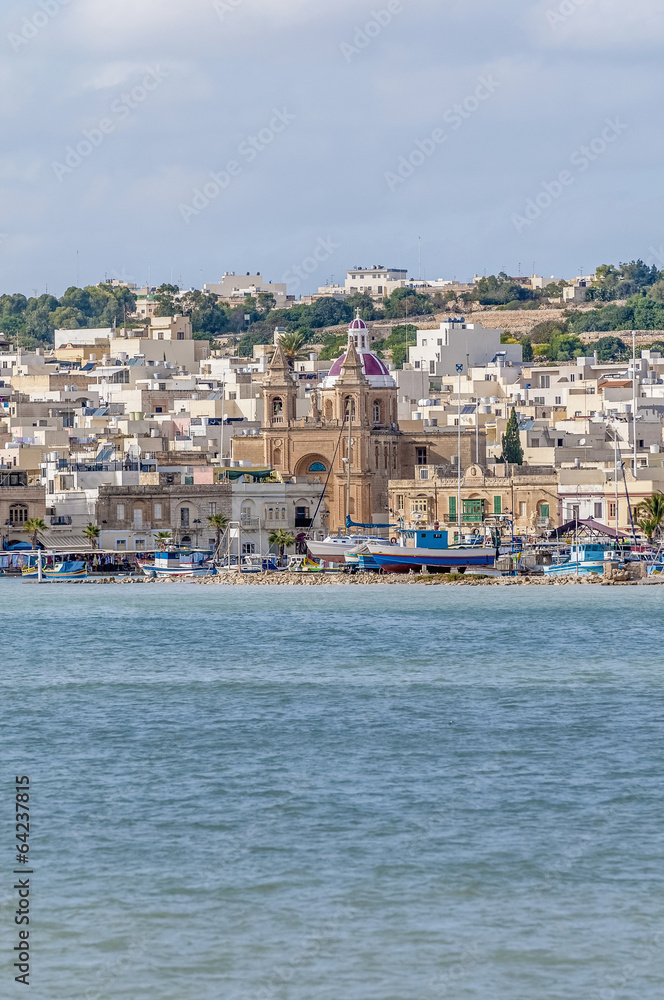 Harbor of Marsaxlokk, a fishing village in Malta. Harbor of Marsaxlokk, a fishing village in Malta.