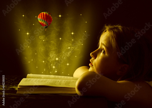 Teen girl reading the Book. Education