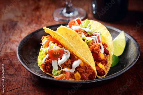 Delicious spicy tacos with meat and vegetables