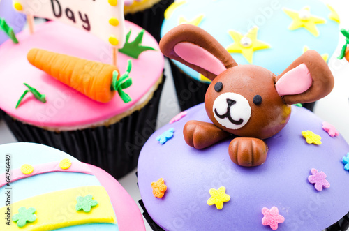 Easter cupcakes isolated white background © siraphol