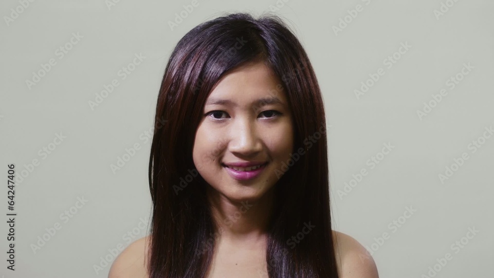 Portrait of asian woman looking at camera, young people Portrait of asian woman looking at camera, young people