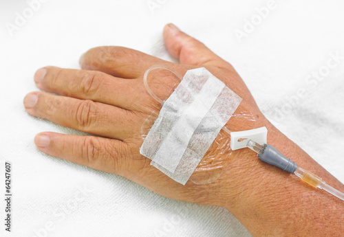 hands of patient with IV solution