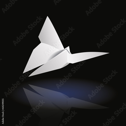 White origami butterfly side on dark background