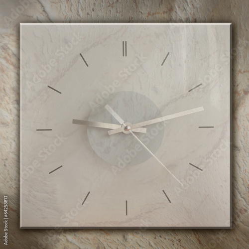 Mottled background with a clock
