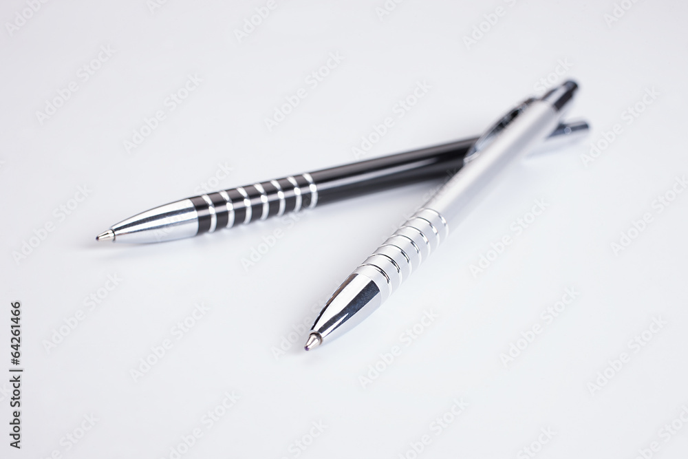 Set of colored pens on table