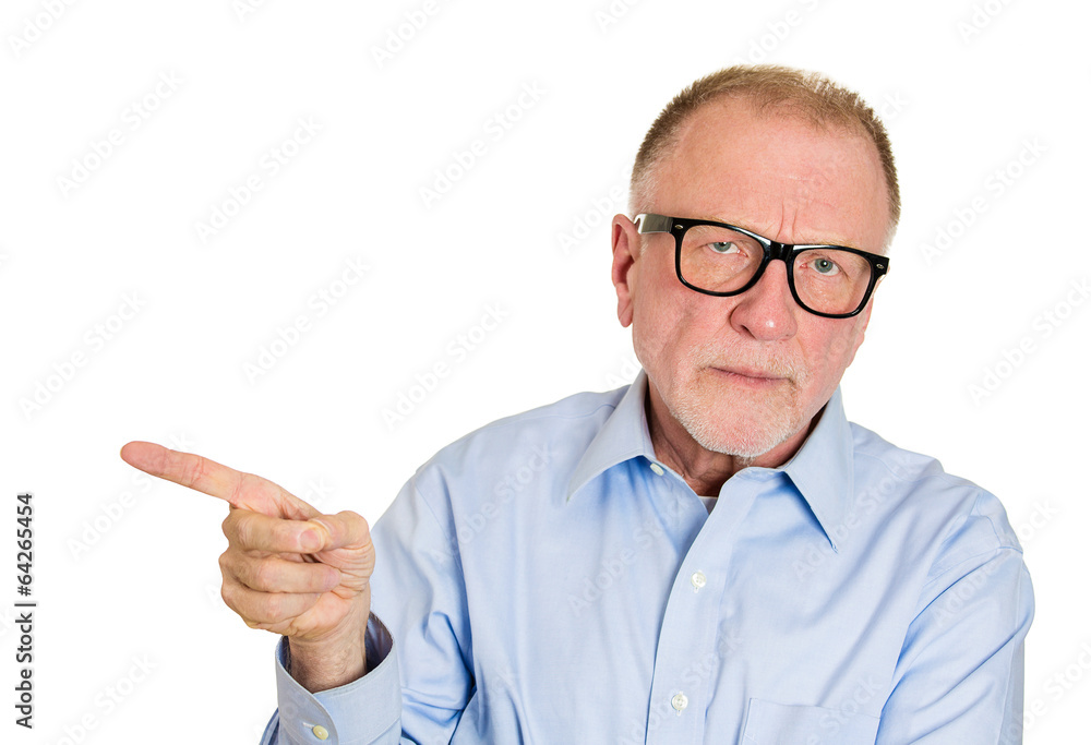 Serious points elderly man accusing someone in wrongdoing Serious points elderly man accusing someone in wrongdoing