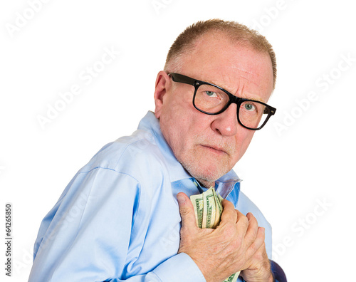 Portrait, headshot Stingy senior man, holding, smelling money photo