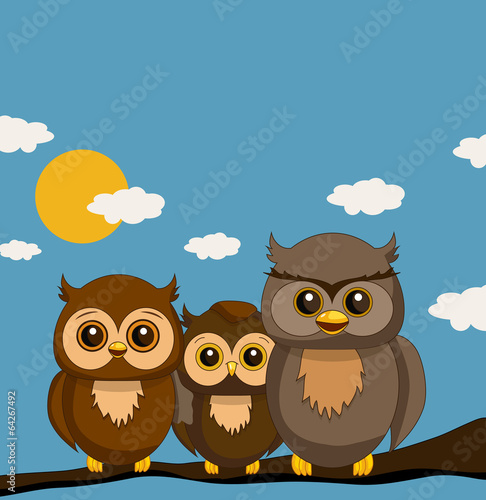 Owl family sitting on stick during sunny summer day