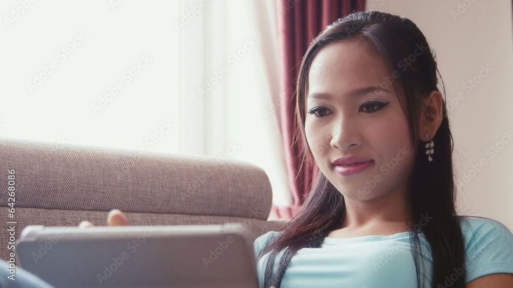 5of22 Asian girl at home with computer, phone and book 5of22 Asian girl at home with computer, phone and book