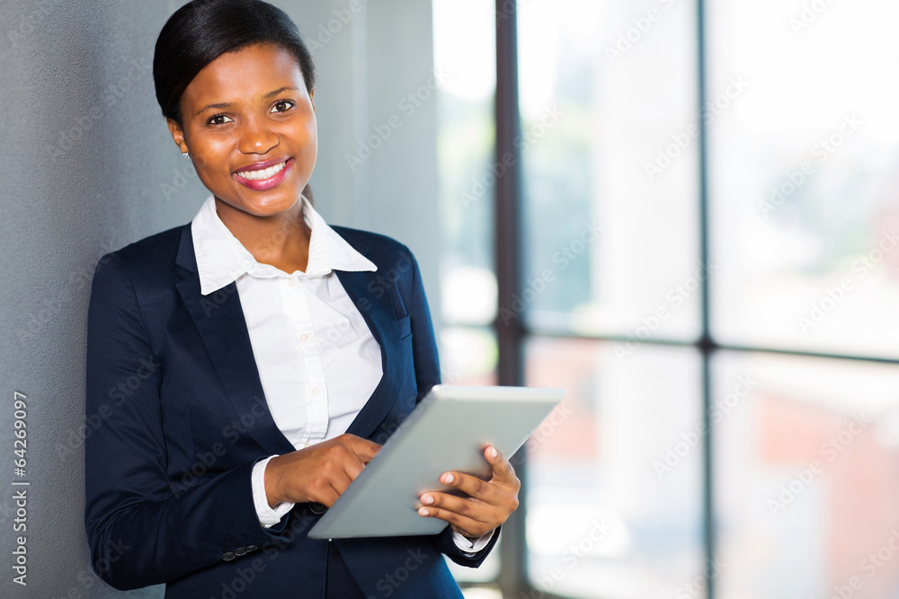 african businesswoman using tablet computer african businesswoman using tablet computer