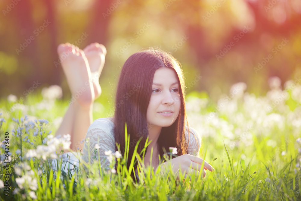 girl lying on a meadow girl lying on a meadow