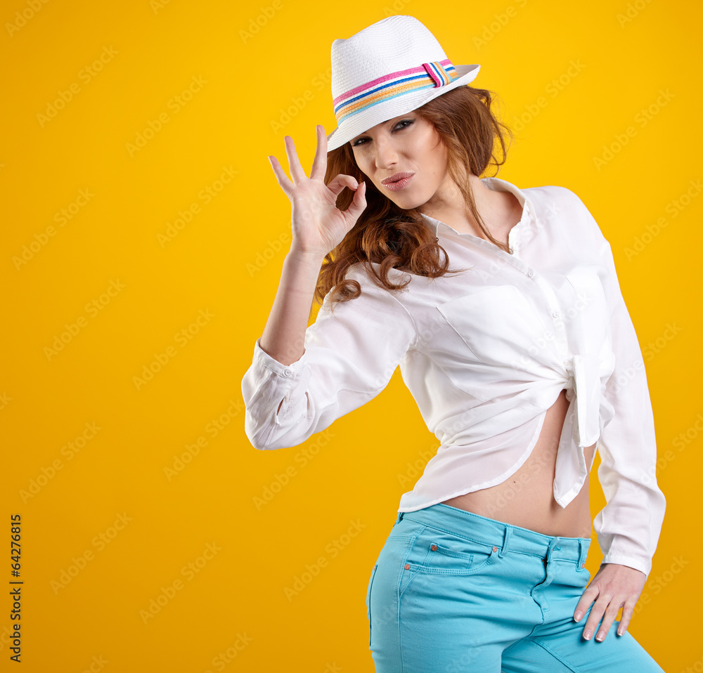 very nice and sexy spring brunette girl with hat in a yellow ba very nice and sexy spring brunette girl with hat in a yellow ba