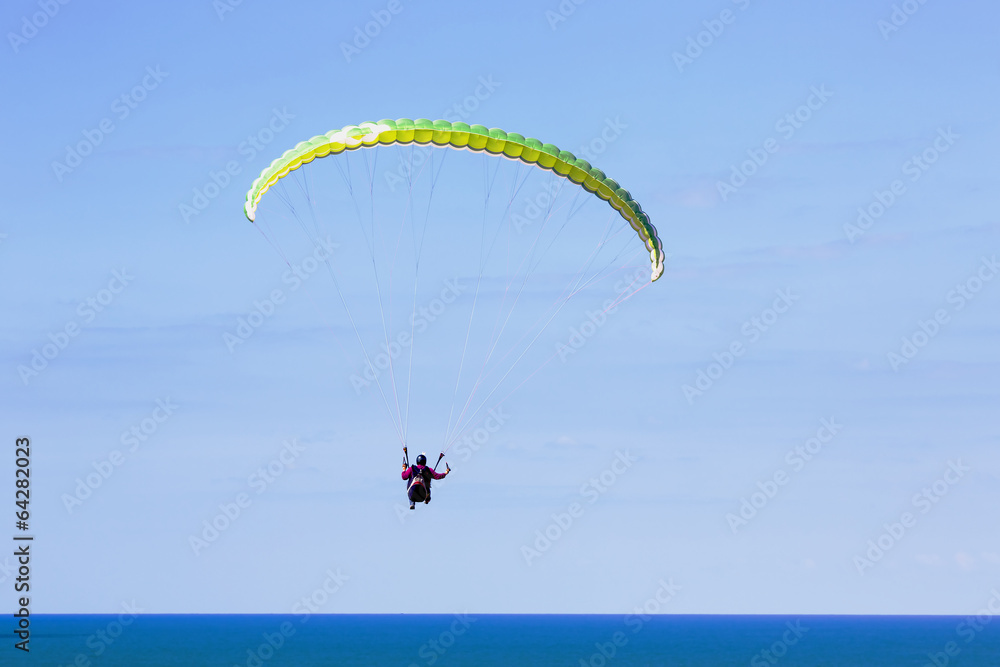 Paraglider flying above Mediterranean near Arsuf coast Paraglider flying above Mediterranean near Arsuf coast