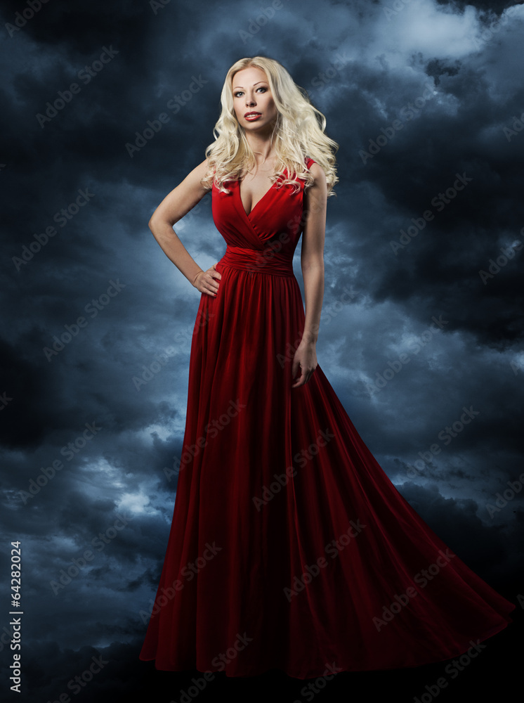 Woman in red dress, long hair blonde in fashion evening gown