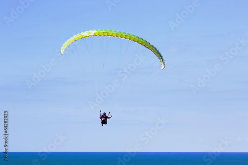 Paraglider flying above Mediterranean near Arsuf coast